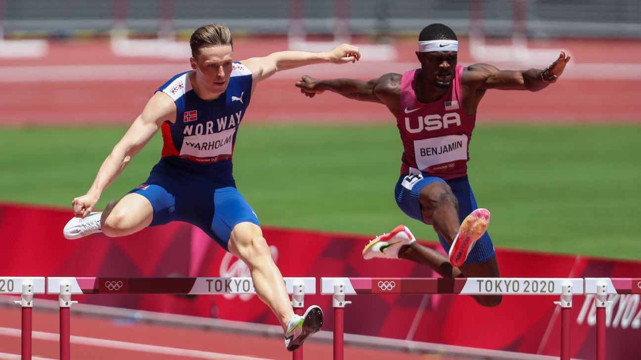 Norway's Karsten Warholm edges American Rai Benjamin in Olympic 400-meter  hurdles as both shatter world record - ESPN