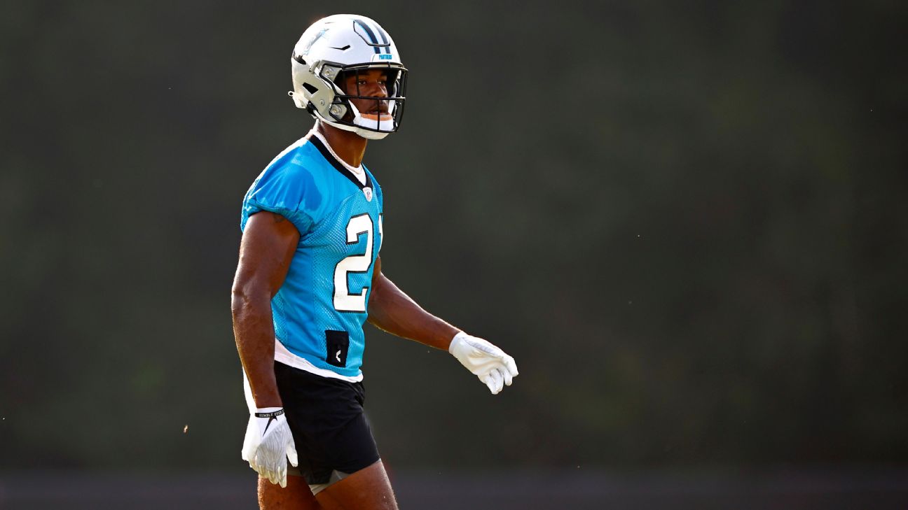 Carolina Panthers safety Jeremy Chinn warms up before an NFL