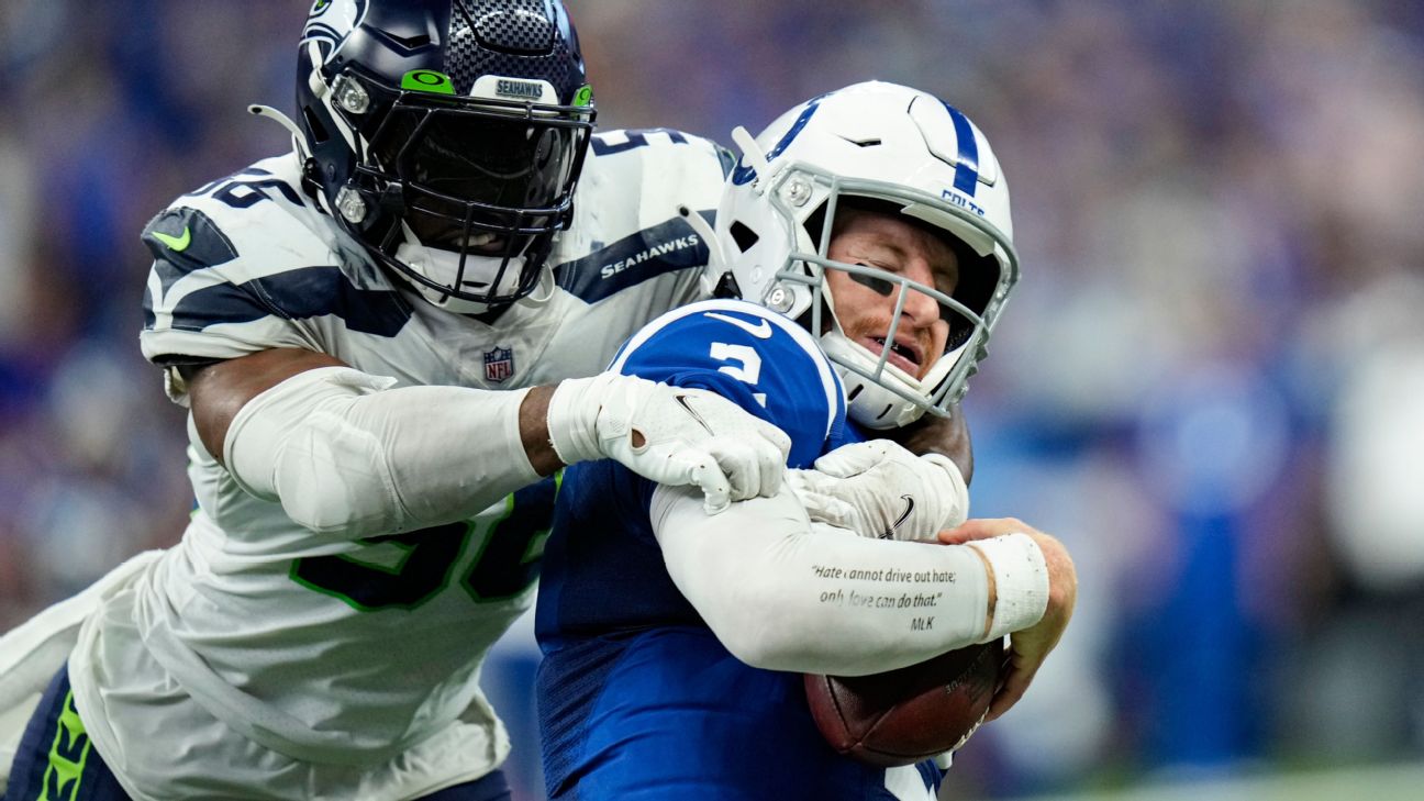 Seattle Seahawks linebacker Cody Barton (57) looks on during an