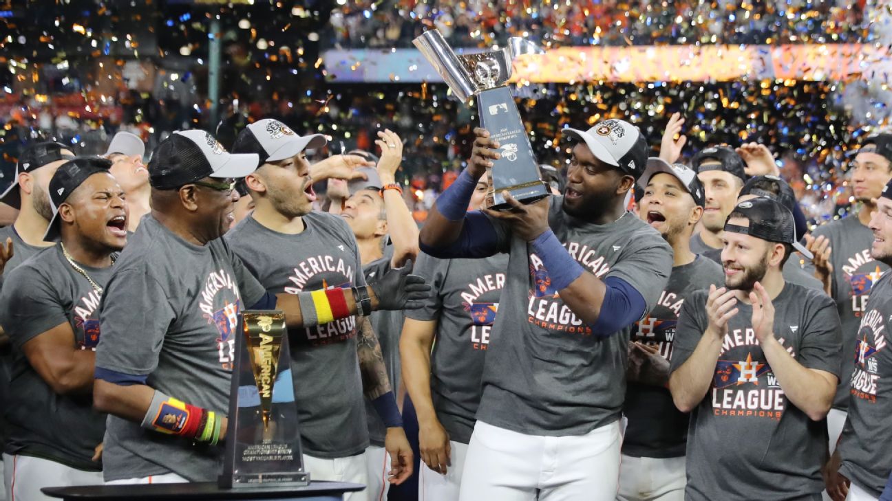 Astros fans receive Yordan Alvarez jersey and take photos with World Series  trophy
