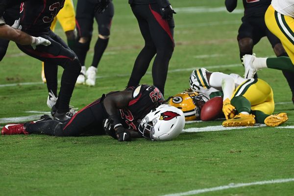 Cards' Ward, Packers' Hill carted off after collision
