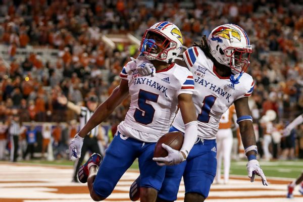 Kansas snaps losing skid and stuns Texas 57-56 in OT