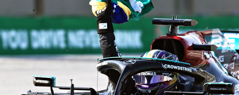Hamilton fined for removing seat belts on slowing down lap