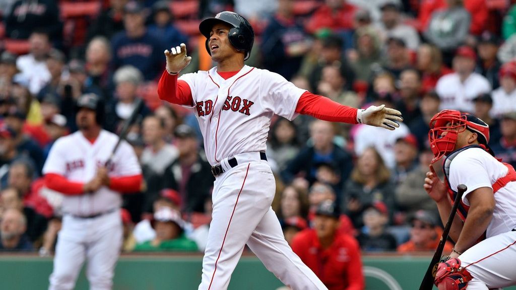 Boston Red Sox shortstop Julio Lugo throws to first baseman Kevin