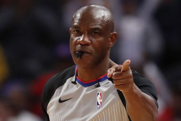 NBA referees wear headsets during games beginning Saturday