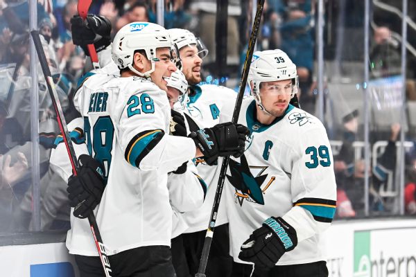 Couture dodges fake octopus, nets Sharks OT win