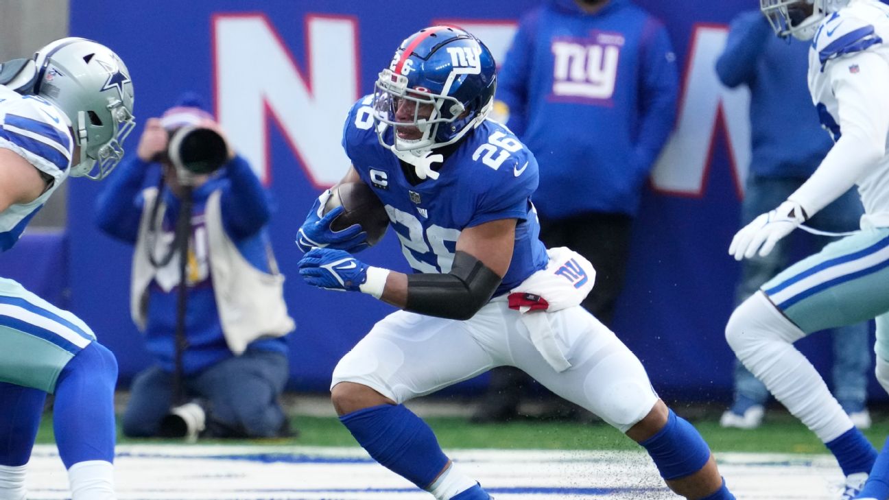 : New York Giants Saquon Barkley Jumps over Chicago