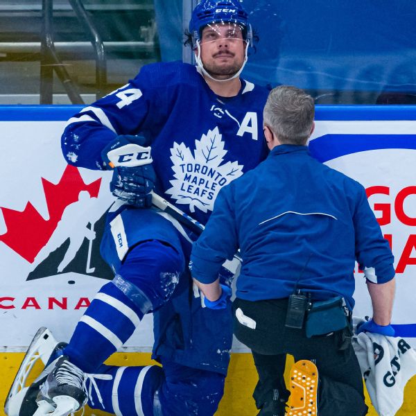 Matthews nets 2, leaves Leafs' OT win with injury