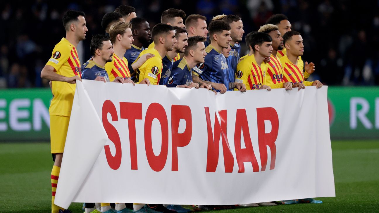 Barcelona, Napoli players hold 'Stop War' banner ahead of Europa League  match
