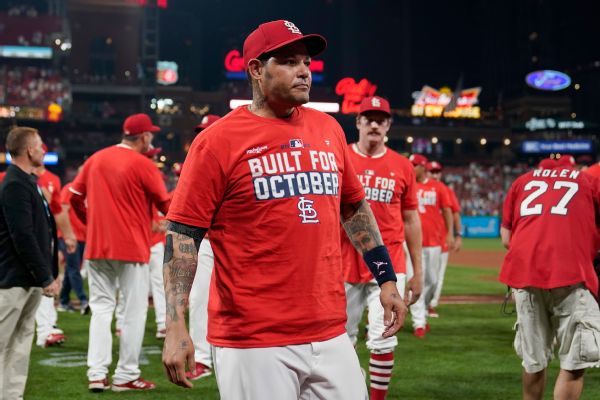 Cardinals' Molina misses start of spring training