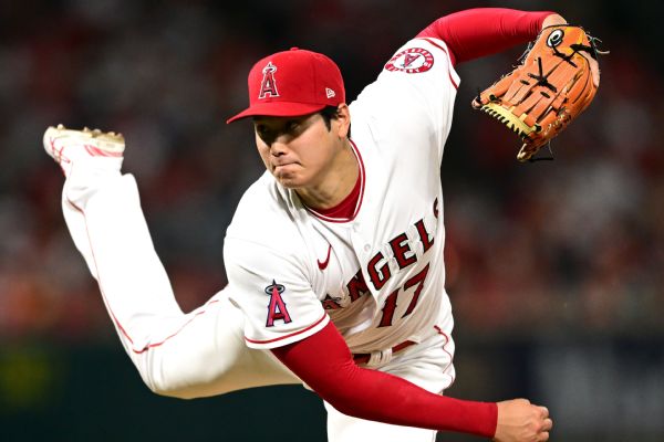 Ohtani fired up on mound, hitless at plate in loss