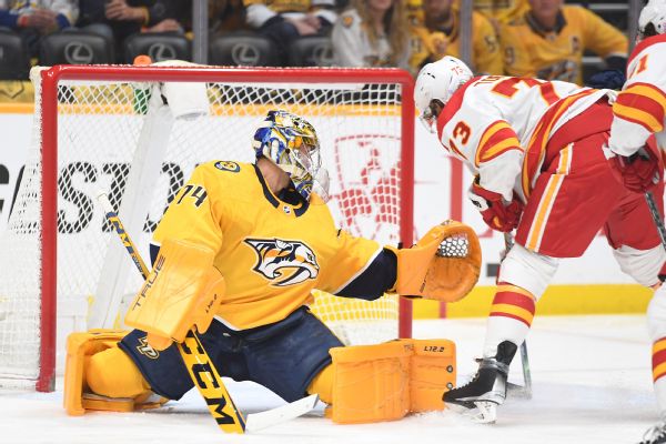 Preds goalie Saros limps off ice with injury in loss