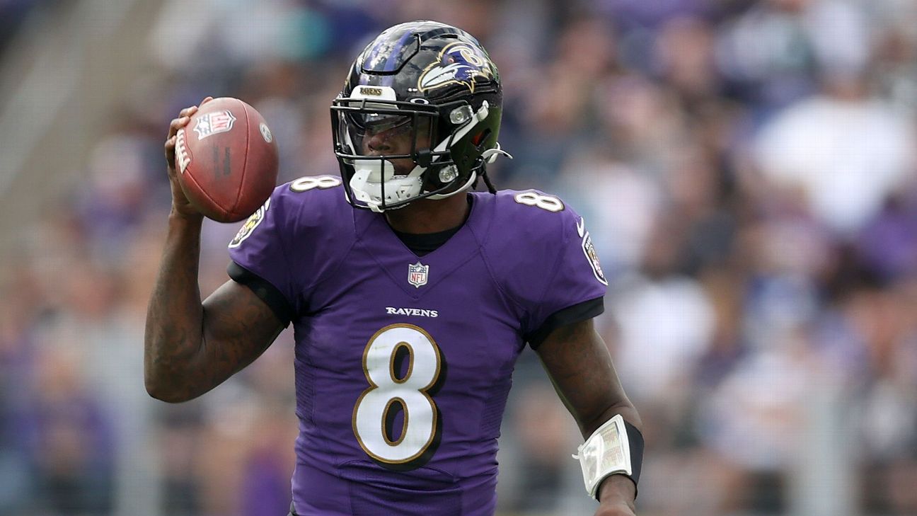 Baltimore Ravens quarterback Lamar Jackson (8) wears his Salute to