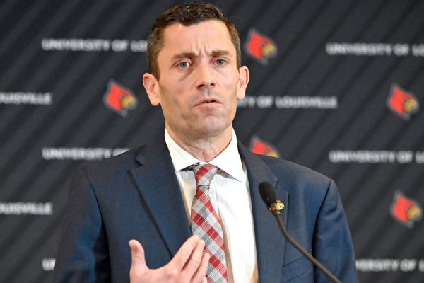 Louisville completes Heird's promotion to AD