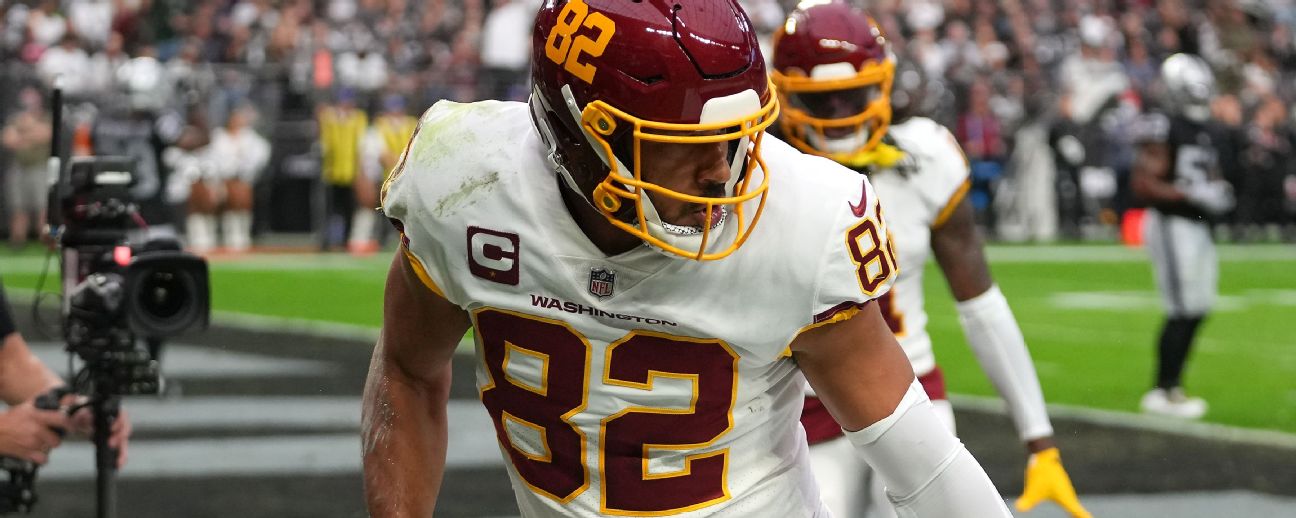 Washington Commanders tight end Logan Thomas (82) runs during an