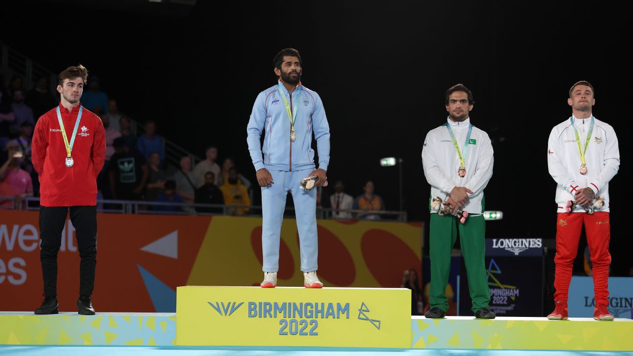 Bajrang Punia wins gold in 65kg wrestling, completes hat-trick of CWG  medals - Hindustan Times