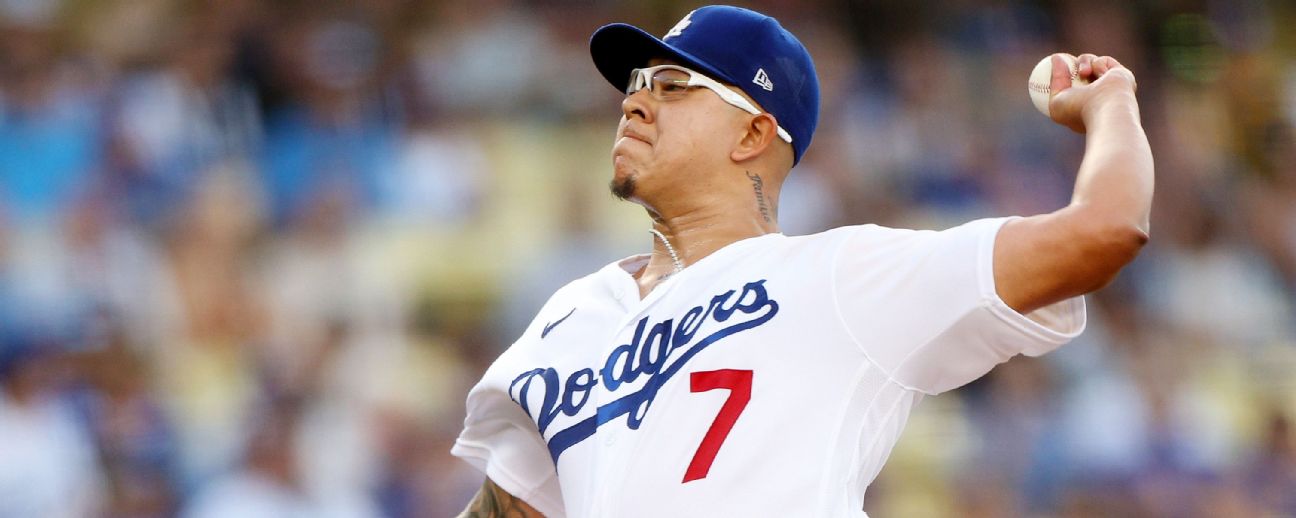 Starting pitcher Julio Urias #7 of the Los Angeles Dodgers warms