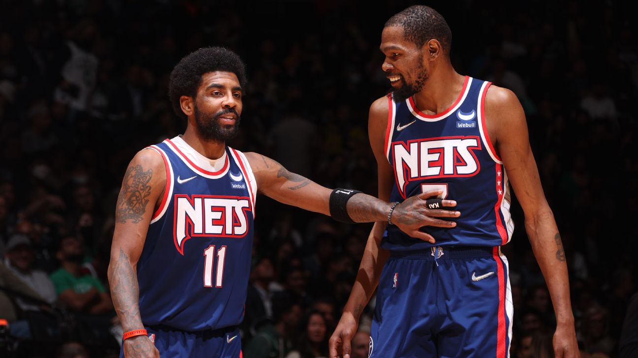 Brooklyn Nets guard Kyrie Irving, center left, and forward Kevin