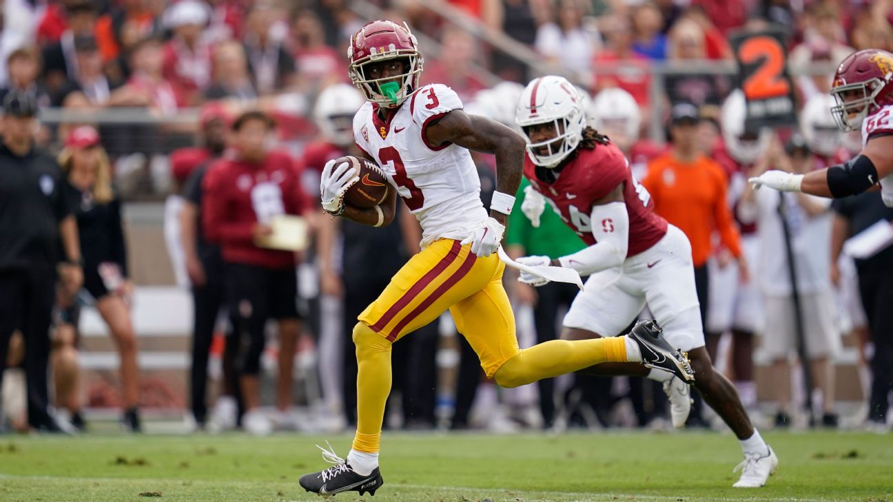 Jordan Addison Suits Up in Pink Florals & Sneakers at NFL Draft 2023 –  Footwear News