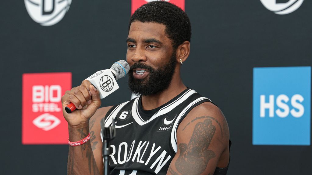 Don't you work here? Unvaccinated Nets star Kyrie Irving watches