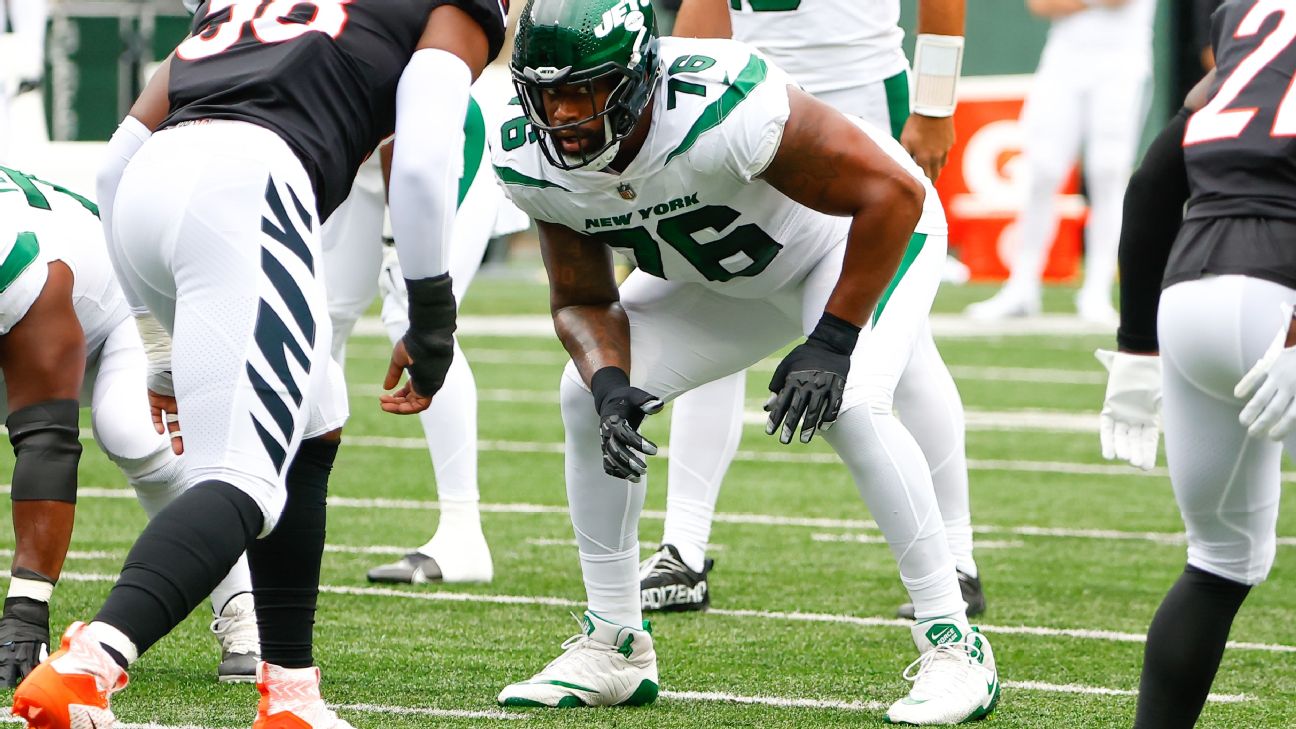 New York Jets offensive tackle George Fant (76) looks to make a block  during an NFL football game against the Cleveland Browns, Sunday, Sept. 18,  2022, in Cleveland. (AP Photo/Kirk Irwin Stock