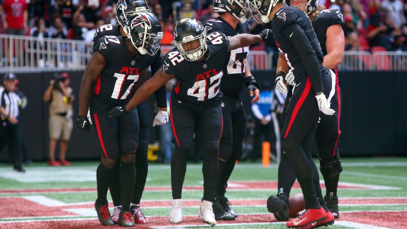 Atlanta Falcons running back Caleb Huntley (42) runs the ball during the  second half of a preseason NFL football game against the Tennessee Titans,  Friday, Aug. 13, 2021, in Atlanta. The Tennessee