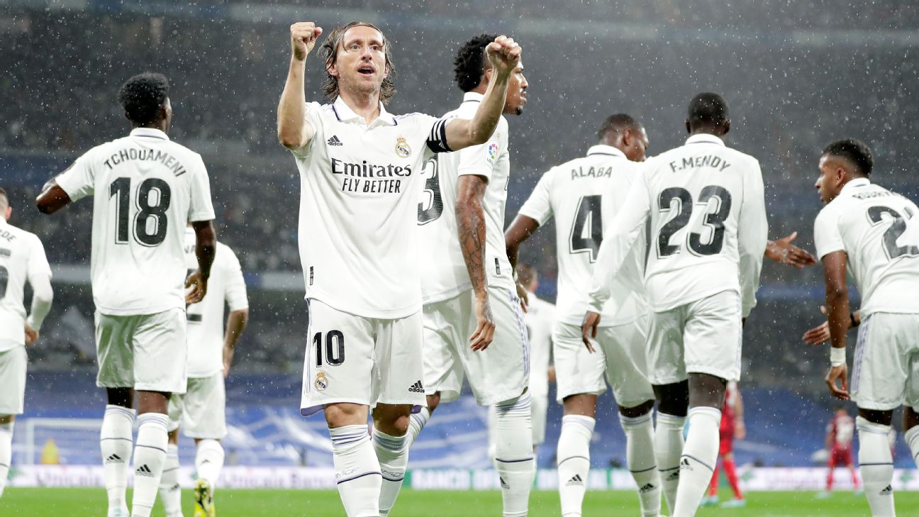 Modric fills in for Benzema as Madrid dig deep to beat Sevilla
