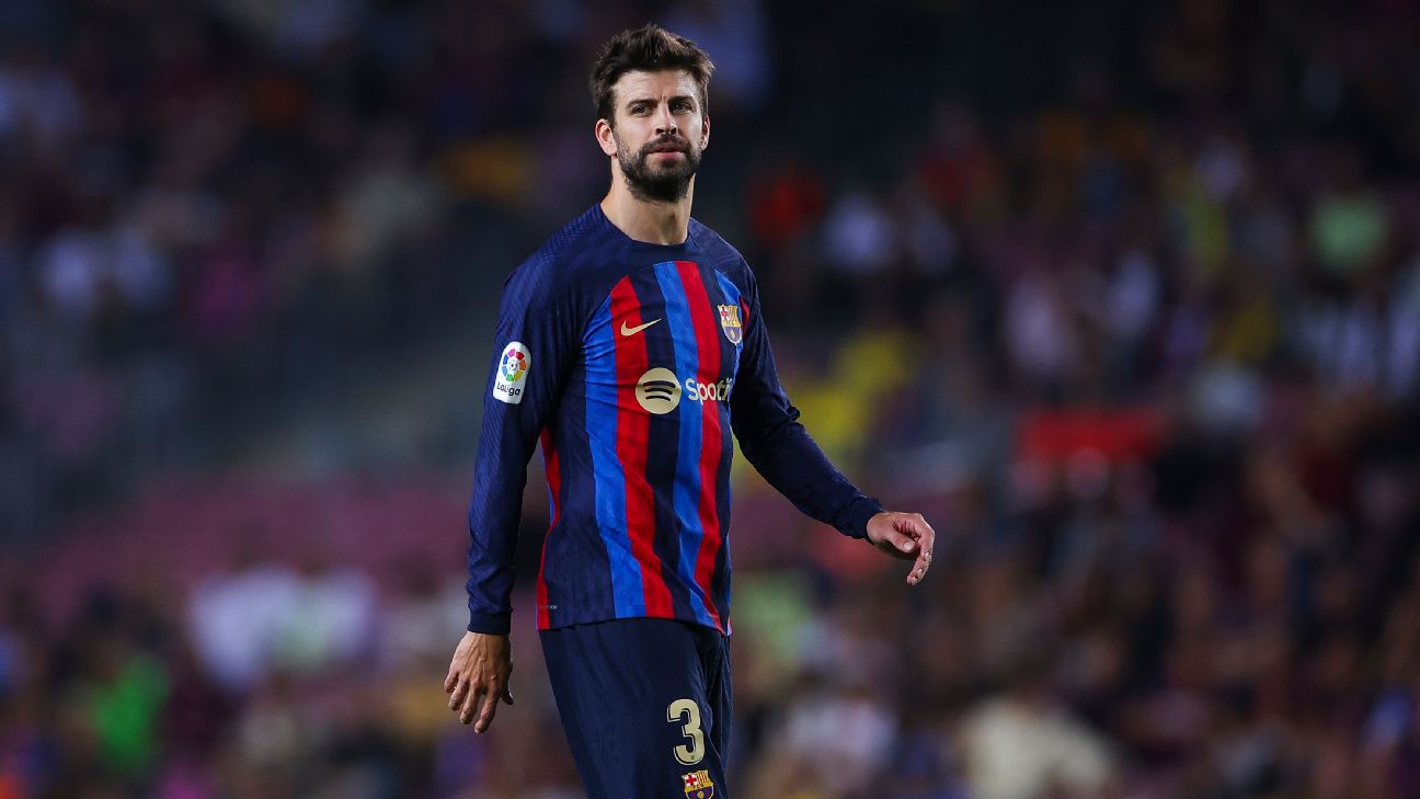 Barca great Pique announces sudden retirement