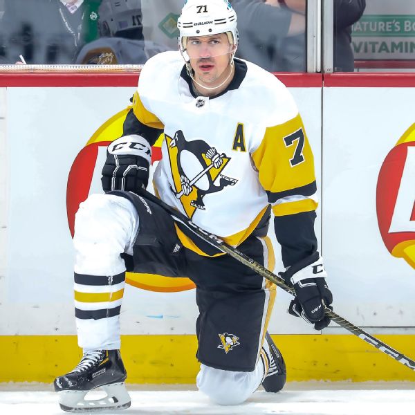 Penyerang Penguins Evgeni Malkin bermain di pertandingan NHL ke-1.000