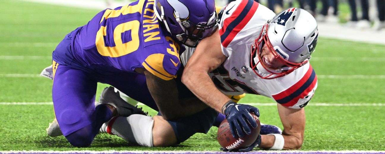 New York Jets' Bryce Hall, left, tackles New England Patriots' Hunter Henry  during the second half of an NFL football game, Sunday, Sept. 19, 2021, in  East Rutherford, N.J. (AP Photo/Bill Kostroun