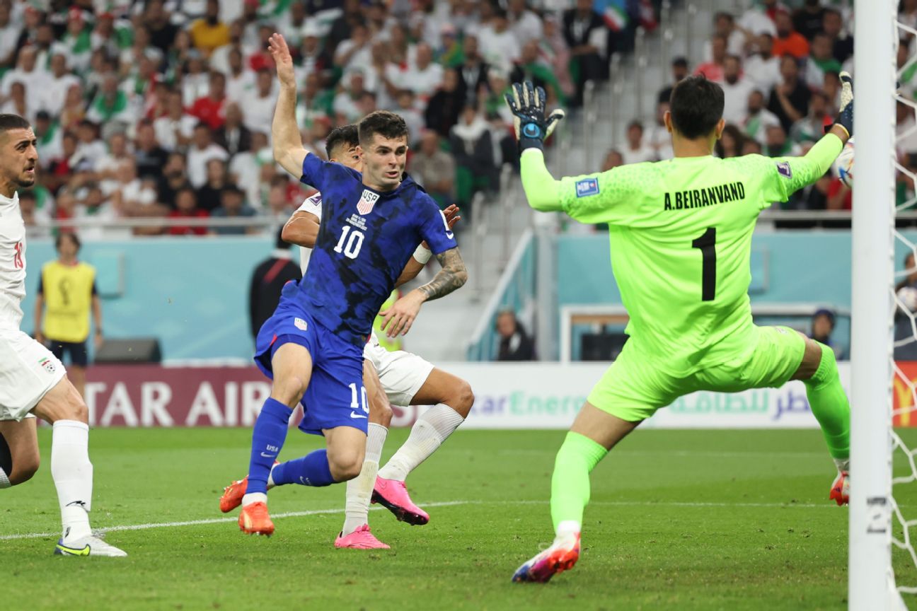 WORLD CUP SOCCER: USA hangs on against Iran to advance