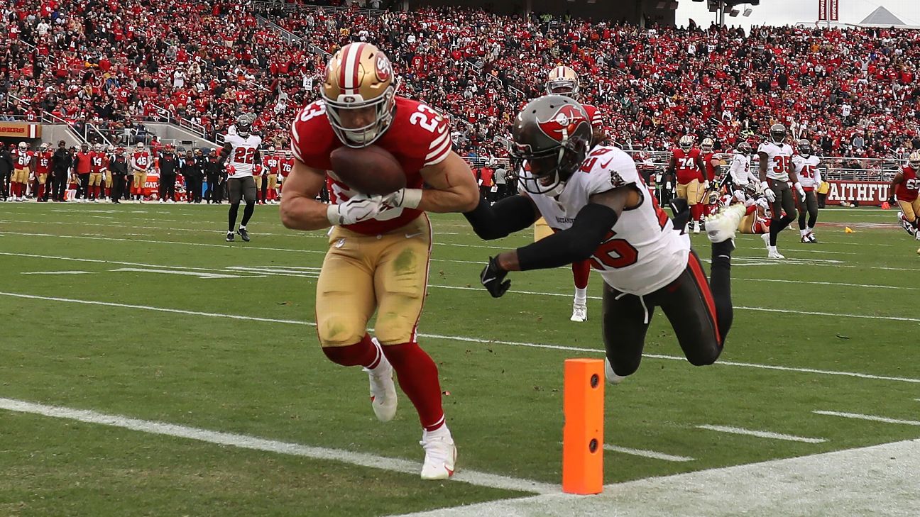 Christian McCaffrey Hurdles Cardinals Defender On the Way to his Second TD