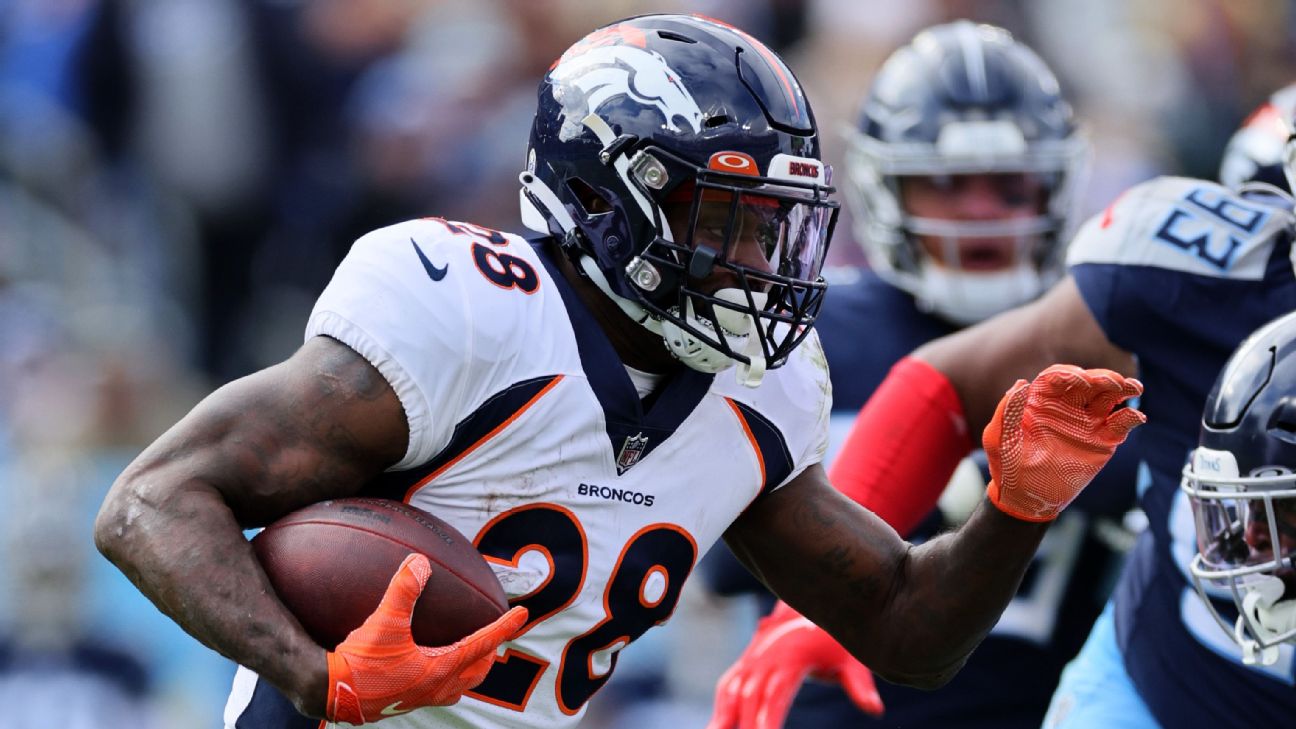 Denver Broncos running back Latavius Murray (28) walks on the sidelines  before the second half of an NFL football game against the Tennessee Titans  Sunday, Nov. 13, 2022, in Nashville, Tenn. (AP