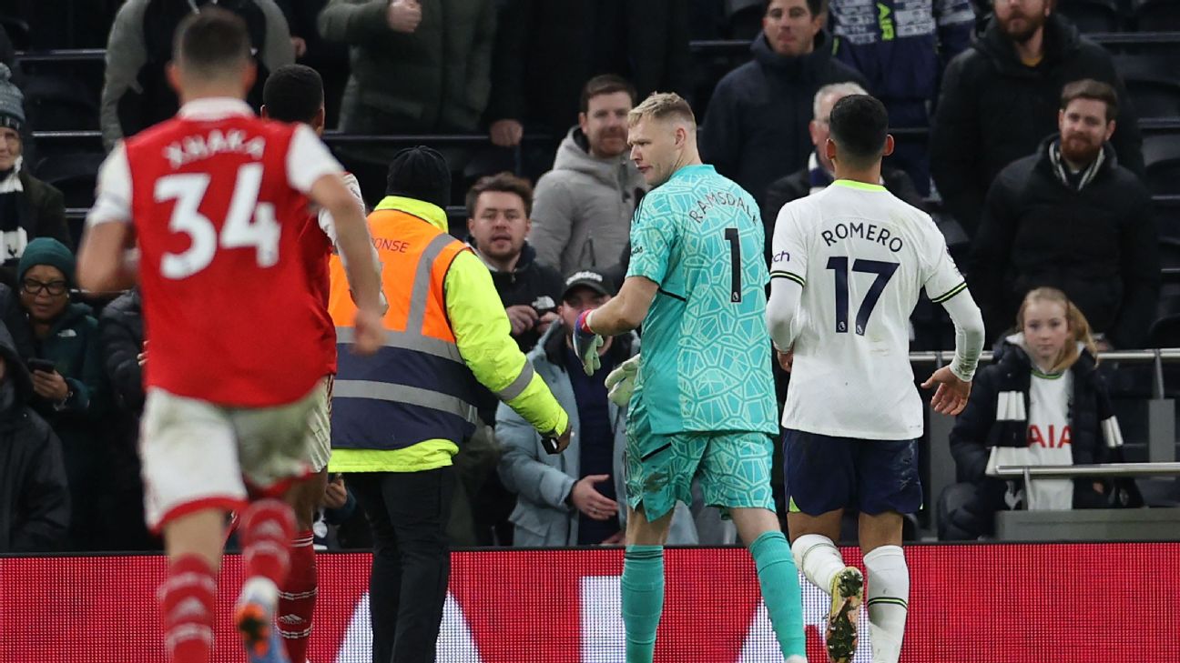 Arsenal goalkeeper Aaron Ramsdale appears to be kicked by