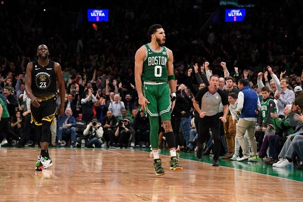 Celtics show playoff 'poise', outduel Dubs in OT