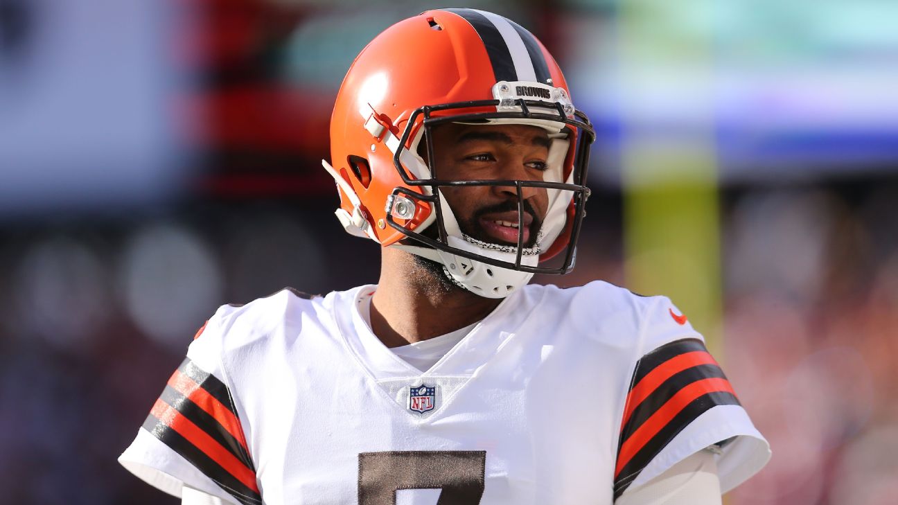 Washington Commanders quarterback Jacoby Brissett signs fan