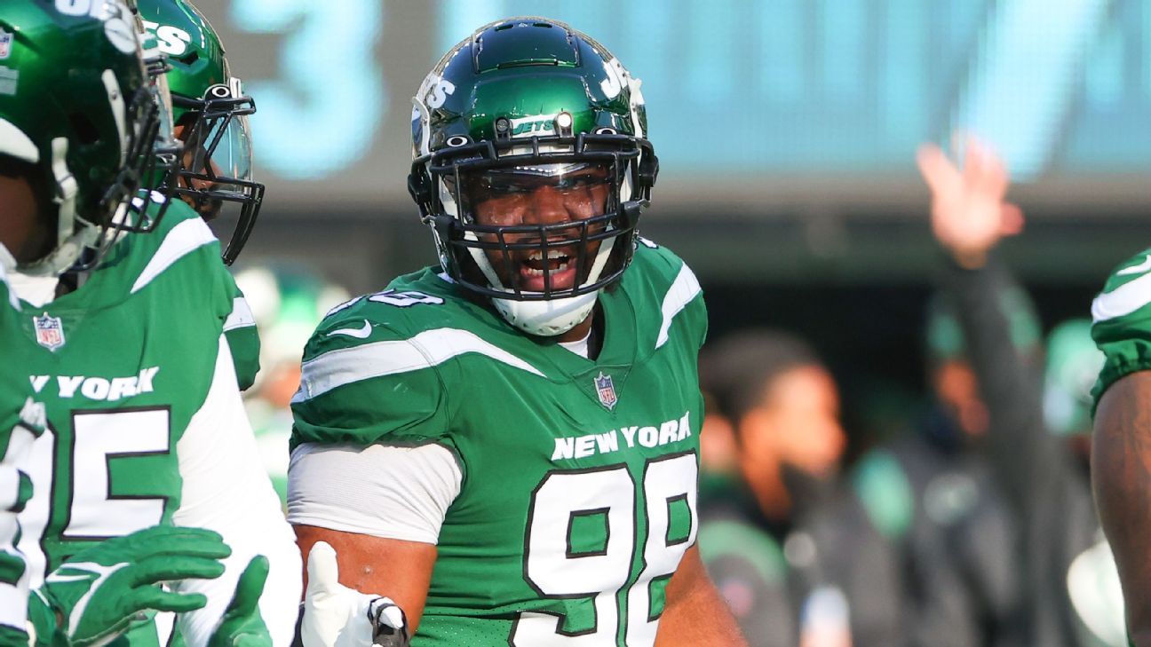 New York Jets defensive tackle Sheldon Rankins tackles Denver