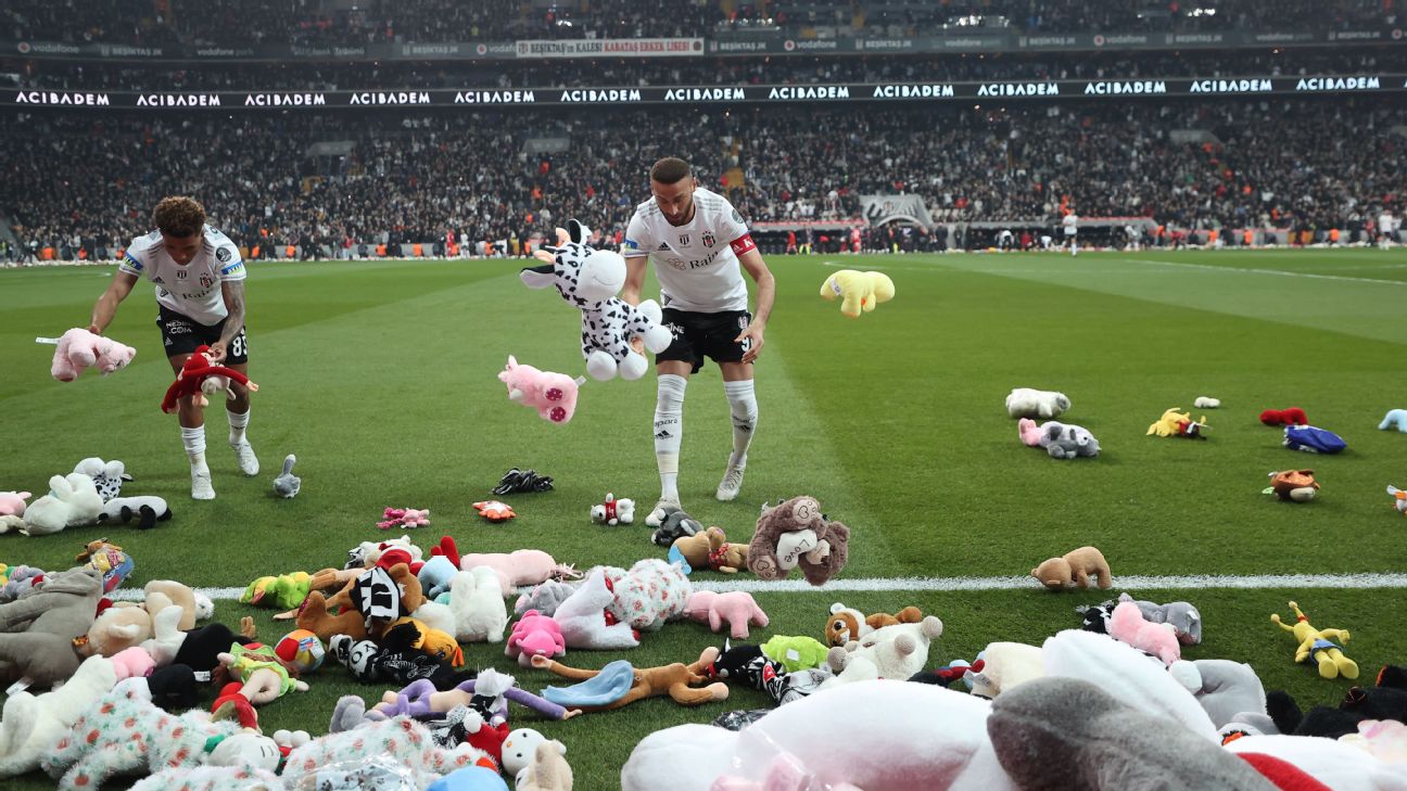 Besiktas vs Antalyaspor delayed as fans throw thousands of toys on pitch  for kids hit by earthquakes