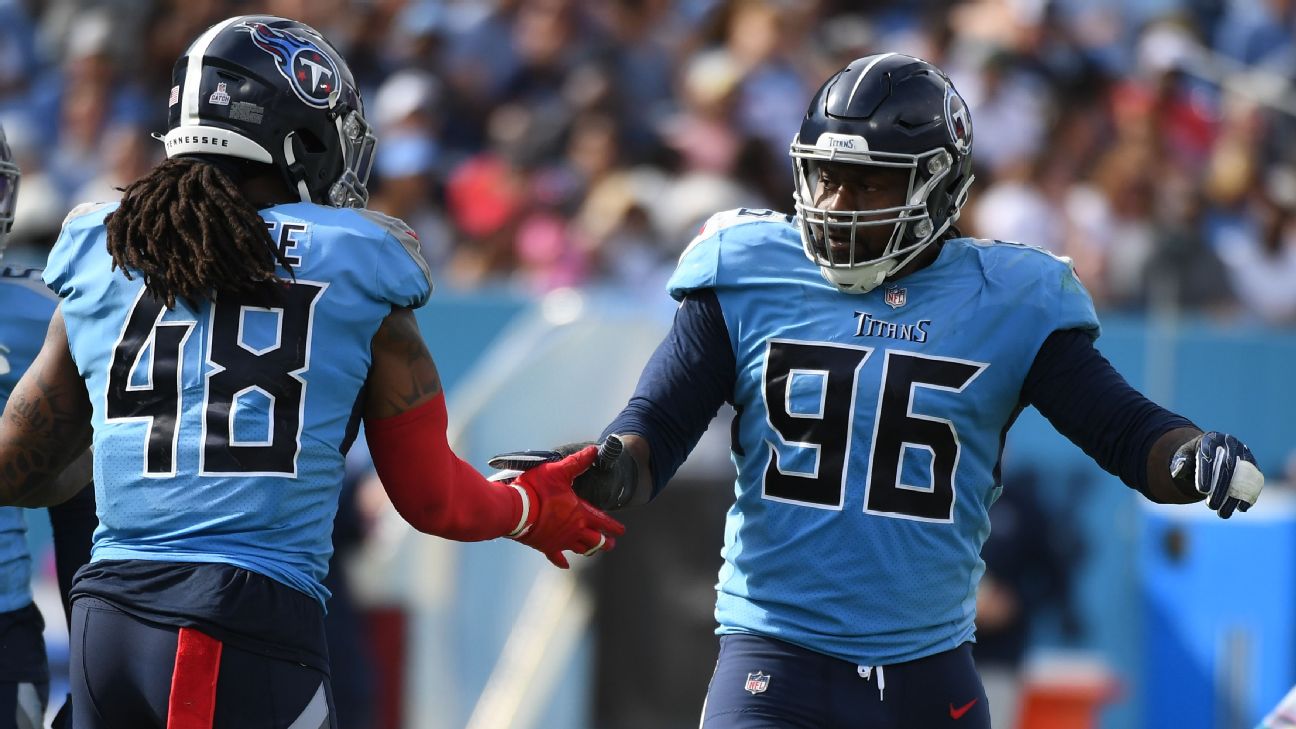 Tennessee Titans wide receiver D.J. Woods (12) works out before