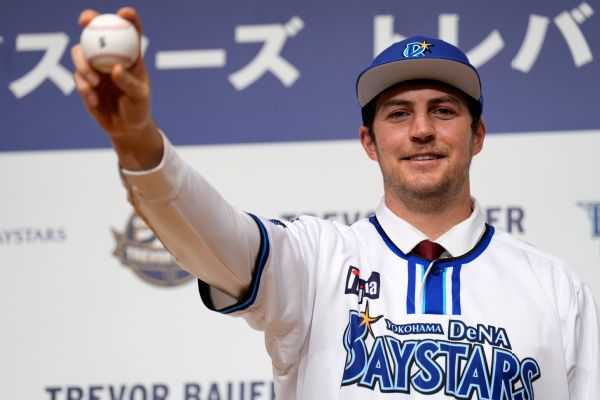 Bauer pitches in Japan for first game in 2 years