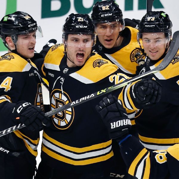 NHL-best Bruins clinch Atlantic with 2-1 win over Tampa Bay