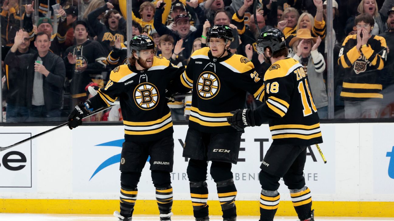 Bruins beat Devils, match NHL record with 62nd win