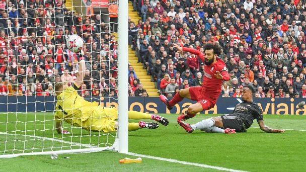 Liverpool stun Arsenal to earn dramatic 2-2 draw