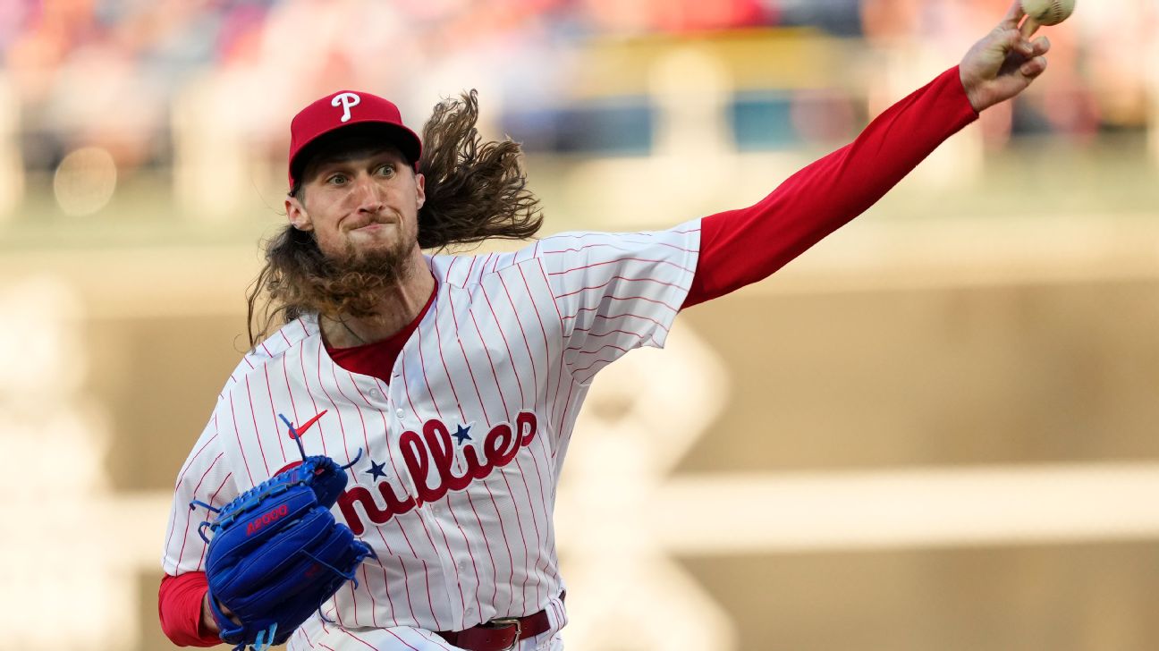 Phils extend LHP Strahm, trade Cave to Rockies