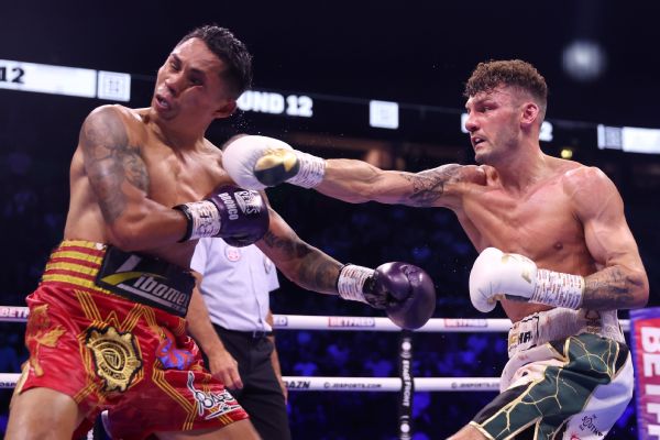 Wood routs Lara to regain title; Catterall cruises