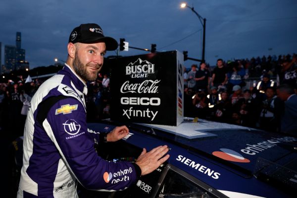 Van Gisbergen wins Cup debut in rainy Chicago