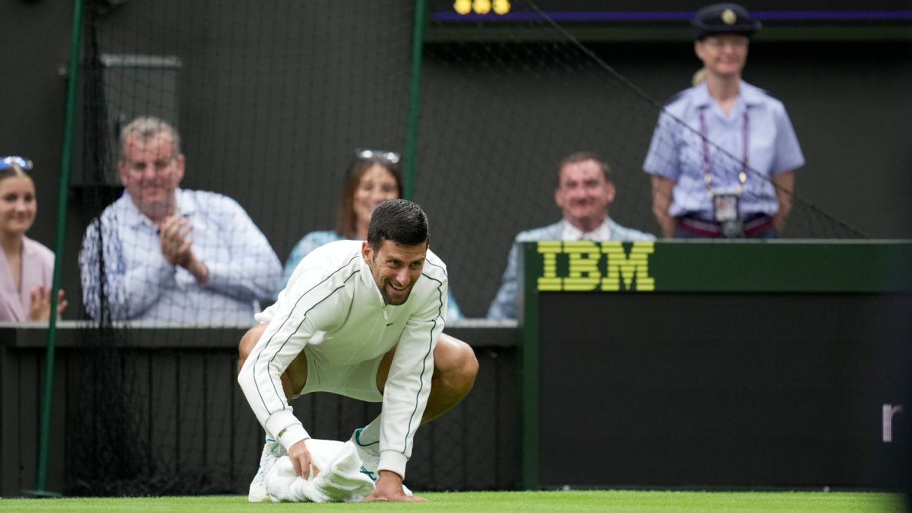 Wimbledon 2023 - Novak Djokovic helps out during Centre Court rain delay