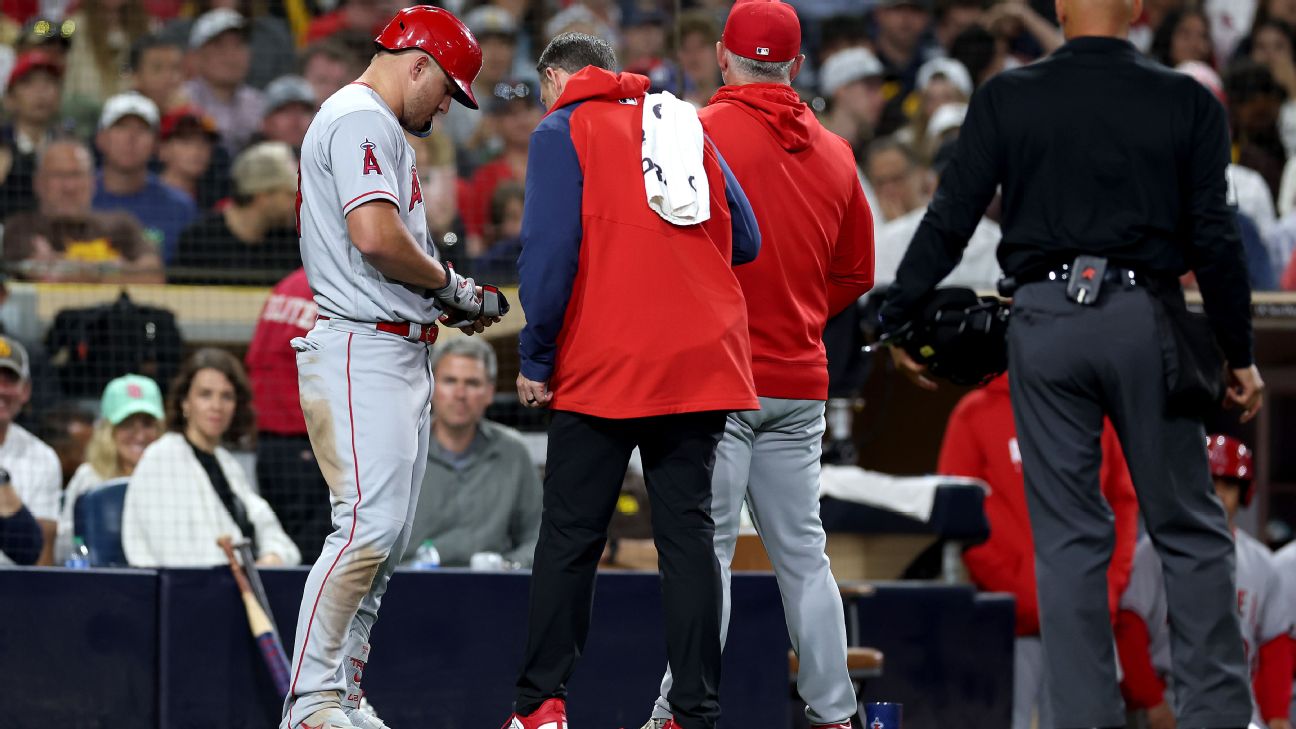 Angels' Mike Trout listed as day to day after being hit in hand by
