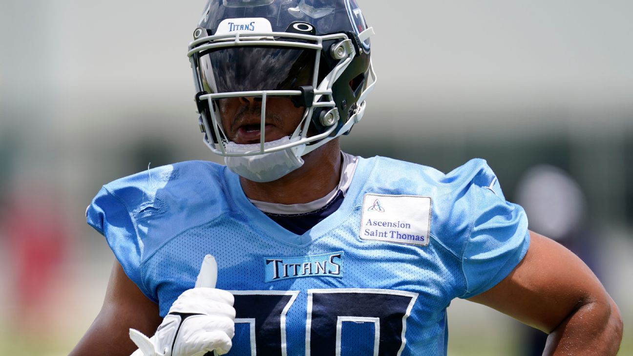 Tennessee Titans linebacker Rashad Weaver (99) comes off the field