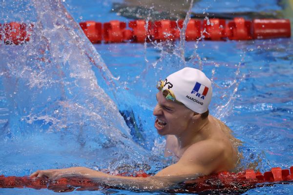 Marchand breaks Phelps’ final solo world record